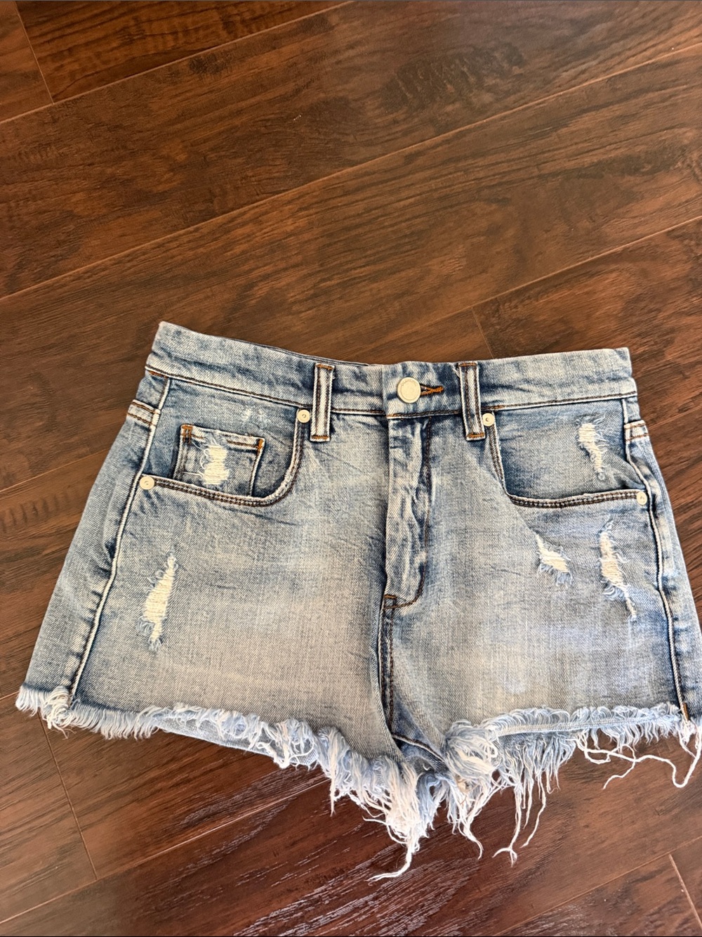 Distressed Light Blue Denim Cutoff Shorts - Women